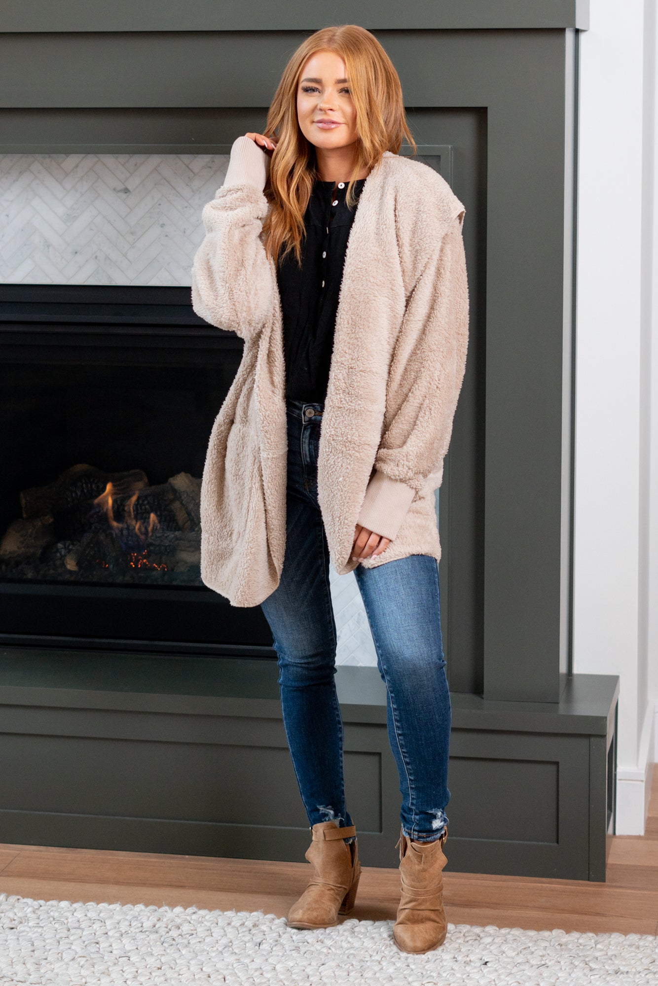 Hem & Thread   This is that cozy jacket you will throw on every day and go! One size fits most with an open neckline and long sleeves and side pockets.   Color: Taupe Neckline: Open  Sleeve: Long 100% POLYESTER Style #: L2394-Taupe Contact us for any additional measurements or sizing. 
