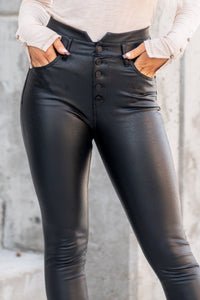 KanCan Jeans  A KanCan stretchy Ponte pant to dress up this winter!   Color: Black Cut: Skinny, 29" Inseam* Rise: High-Rise, 10.25" Front Rise* 100% PU + 95% POLYESTER , 5% SPAN BACKING Fly: Button Fly  Style #: KC2015BK *Measured on the smallest size, measurements may vary by size.  Contact us for any additional measurements or sizing.
