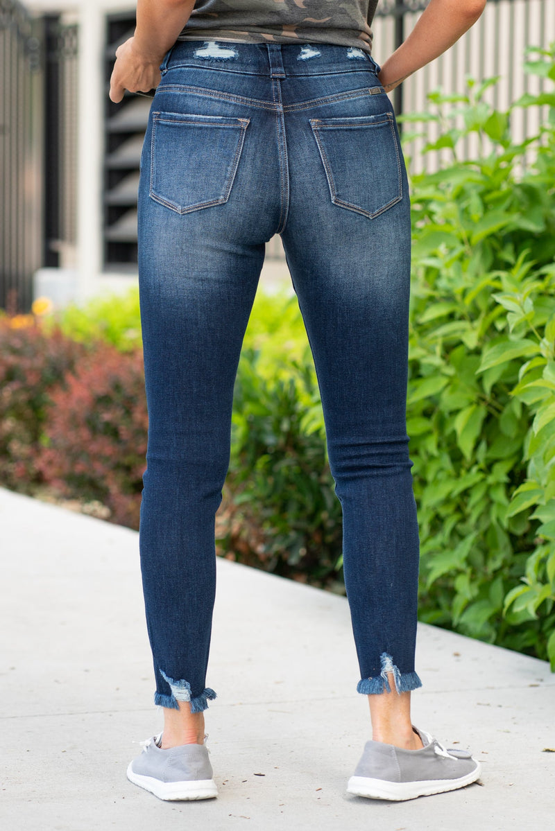 KanCan Jeans Color: Dark Wash Ankle Skinny, 27" Inseam* High Rise, 11" Front Rise* Frayed Hem Ankle with Ripped Distress 95% COTTON , 3.5% POLYESTER , 1.5% SPANDEX Fly: Zipper with Double Button Style #: KC70007D Contact us for any additional measurements or sizing.    *Measured on the smallest size, measurements may vary by size. 