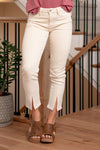 Belinda Mid Rise Skinny Straight Leg Jeans comes in three beautiful color tones. Made with stretchy denim fabric that hugs your body in the right places. This jean sits right at the waist for an easy fit that's both comfortable and chic. Features a front center slit, for an edgier look and feel.  Color: Cream Cut: Skinny Straight, 27" Inseam* Rise: Mid-Rise, 9.5" Front Rise* Material: 94.8% Cotton, 4% t-400, 1.2% Spandex Stitching: Classic Fly: Zipper  Style #: KC7453CM