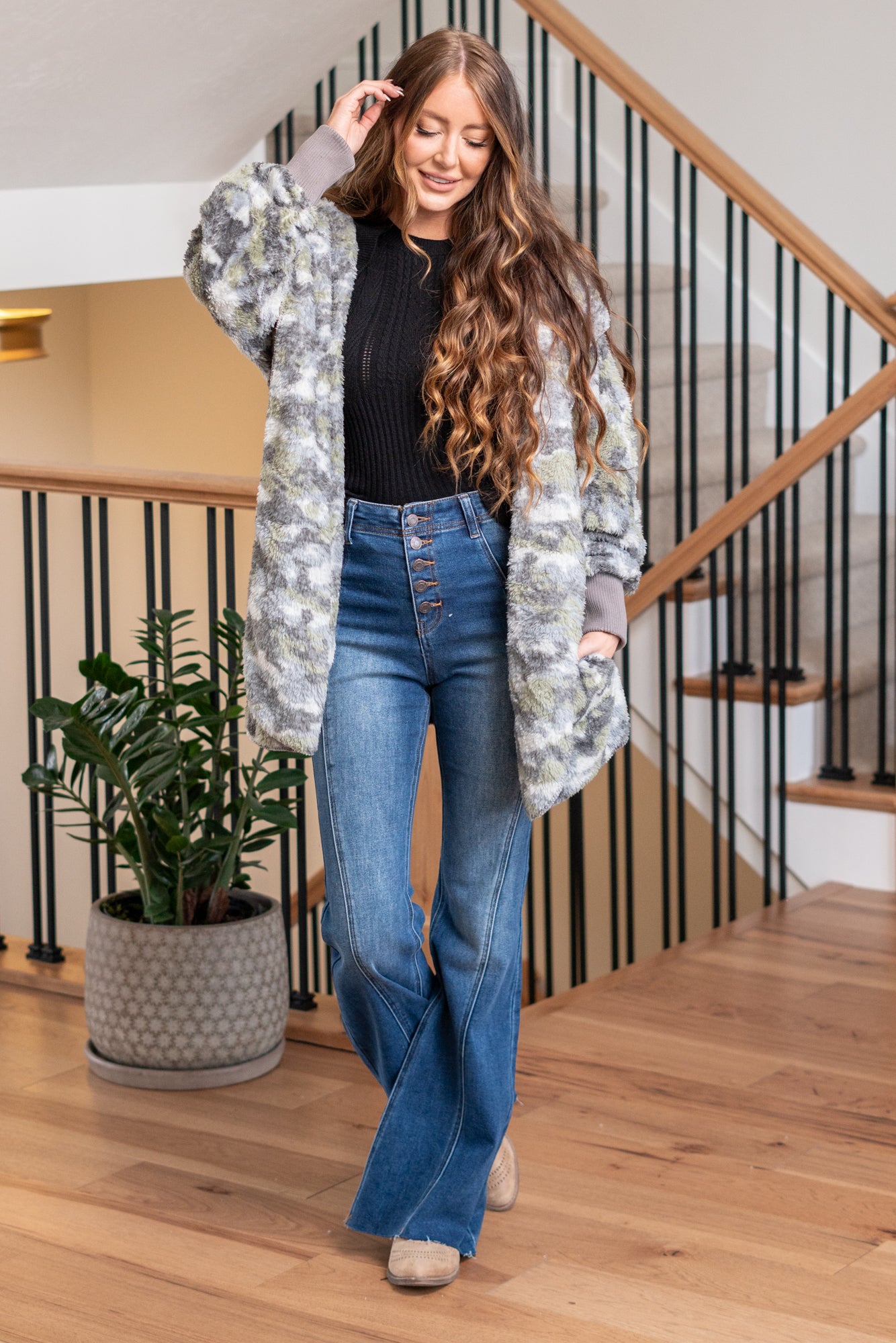 Hem & Thread   This is that cozy jacket you will throw on every day and go! One size fits most with an open neckline and long sleeves and side pockets.   Color: Gray Camo Neckline: Open  Sleeve: Long 100% POLYESTER Style #: 19919C-GrayCamo