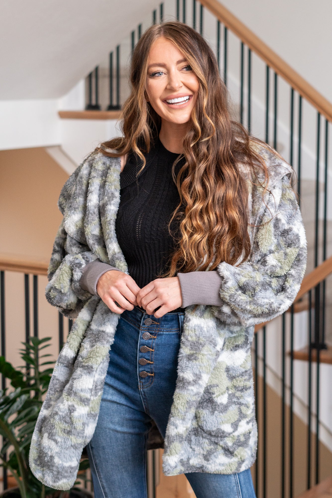 Hem & Thread   This is that cozy jacket you will throw on every day and go! One size fits most with an open neckline and long sleeves and side pockets.   Color: Gray Camo Neckline: Open  Sleeve: Long 100% POLYESTER Style #: 19919C-GrayCamo