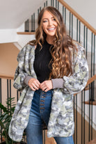 Hem & Thread   This is that cozy jacket you will throw on every day and go! One size fits most with an open neckline and long sleeves and side pockets.   Color: Gray Camo Neckline: Open  Sleeve: Long 100% POLYESTER Style #: 19919C-GrayCamo