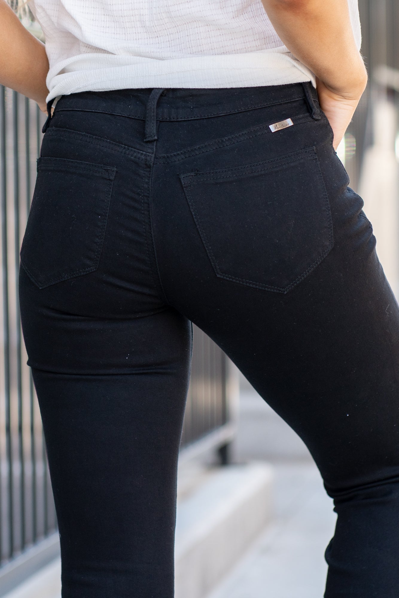 KanCan Jeans Collection: Core Style  Color: Black Cut: Flare, 33.75" Inseam* Rise: Mid-Rise, 9" Front Rise* Material: 65% COTTON , 33% RAYON , 2% SPANDEX Fly: Zipper  Style #: KC6102BK *Measured on the smallest size, measurements may vary by size.  Contact us for any additional measurements or sizing.