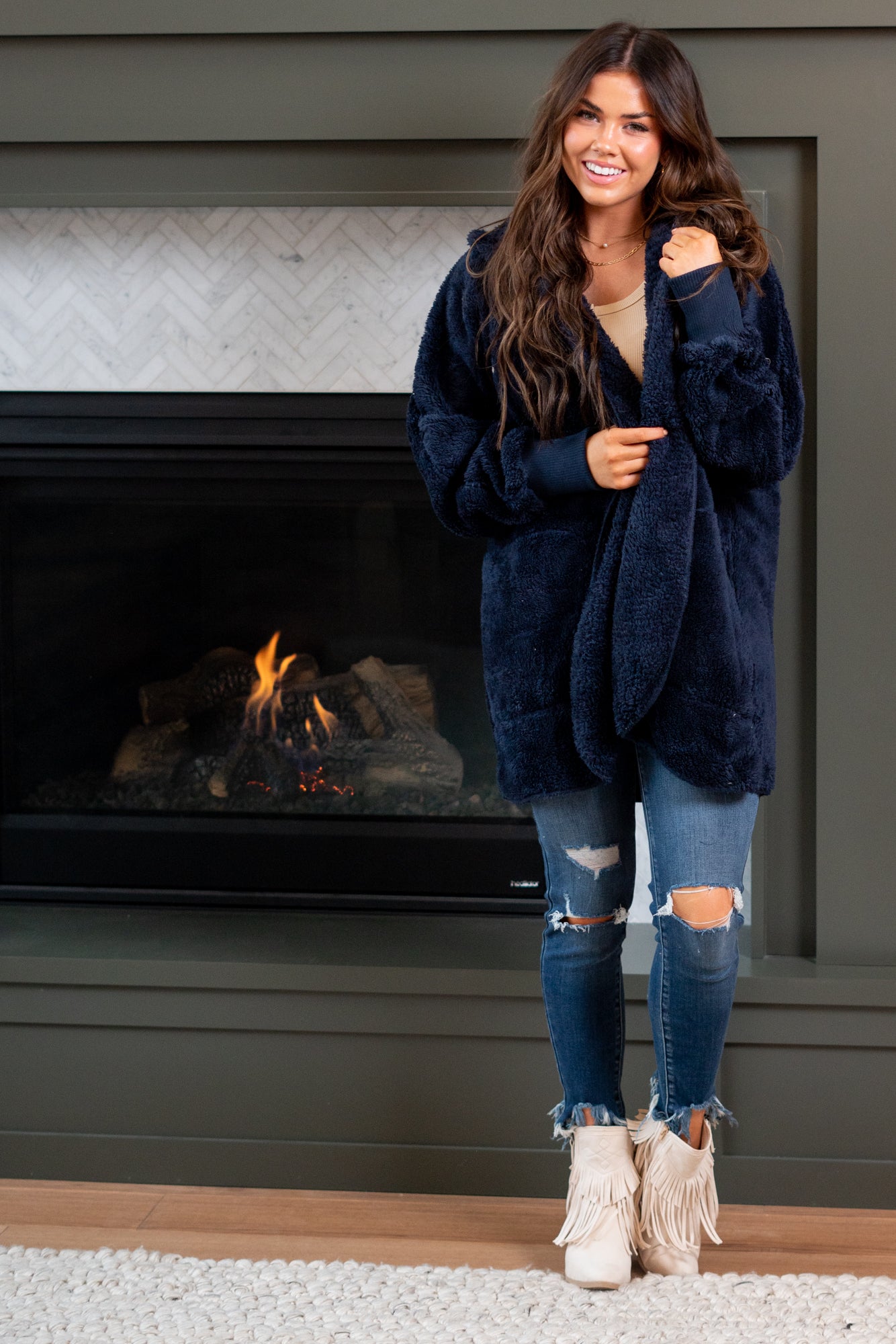 Hem & Thread   This is that cozy jacket you will throw on every day and go! One size fits most with an open neckline and long sleeve and side pockets.   Color: Navy Neckline: Open  Sleeve: Long 100% POLYESTER Style #: L2394-Navy Contact us for any additional measurements or sizing. 
