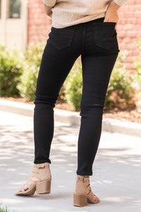 KanCan Jeans  Collection: Core Style Color: Black Cut: Ankle Skinny, 27.5" Inseam Rise: High-Rise, 9.5" Front Rise COTTON 38.1% POLYESTER 29.5% TENCEL 31.2% SPANDEX 1.2% Fly: Zipper  Style #: KC7312BK Contact us for any additional measurements or sizing. 