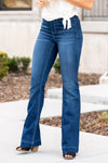Cello Jeans Get comfortable and trendy in these ultra stretchy jeans. The dark wash flared jegging features a flattering flared fit, a faded wash, and light whisker detail. Additionally it has two faux front pockets and two back real pockets. Collection: Spring 2021 Pull On Flare  Color: Dark Blue Wash  Cut: Flare, 33" Inseam Rise: Mid Rise, 8.5" Front Rise 57% Cotton 26.4% Polyester 14.2% Rayon 2.4% Spandex Fly: Zipper Style #: AB35324DK Contact us for any additional measurements or sizing.