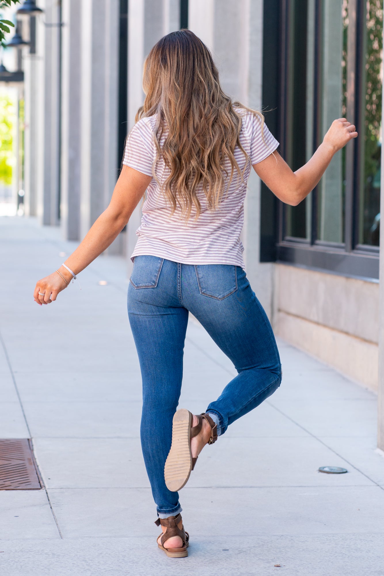 KanCan Jeans  Stevens Point is KanCans signature super skinny with a mid rise fit. These have a fitted leg with knee distressing and a whiskered wash in medium blue.  Color: Medium Wash Ankle Skinny, 30.5" Inseam* Mid Rise, 9.25" Front Rise* Distressed Knees 72% COTTON, 25% POLYESTER, 3% SPANDEX Fly: Zipper Style #: KC11237M Contact us for any additional measurements or sizing.    *Measured on the smallest size, measurements may vary by size. 