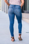 KanCan Jeans  Stevens Point is KanCans signature super skinny with a mid rise fit. These have a fitted leg with knee distressing and a whiskered wash in medium blue.  Color: Medium Wash Ankle Skinny, 30.5" Inseam* Mid Rise, 9.25" Front Rise* Distressed Knees 72% COTTON, 25% POLYESTER, 3% SPANDEX Fly: Zipper Style #: KC11237M Contact us for any additional measurements or sizing.    *Measured on the smallest size, measurements may vary by size. 