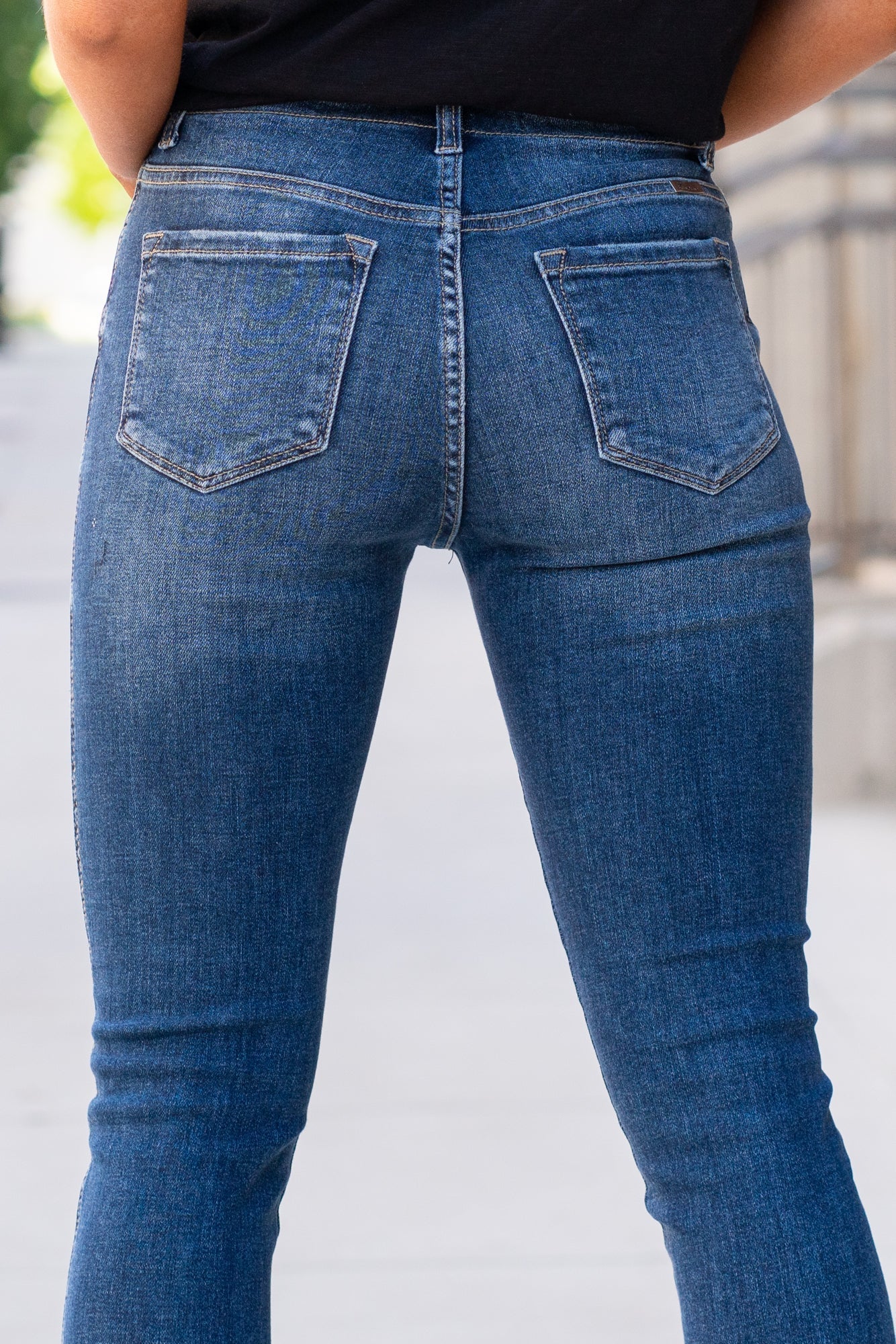 KanCan Jeans Color: Dark Wash Ankle Skinny, 27" Inseam* High Rise, 11" Front Rise* Frayed Hem Ankle with Ripped Distress 93% COTTON, 6% POLYESTER, 1% SPANDEX Fly: Exposed Button Fly Style #: KC2517D Contact us for any additional measurements or sizing.    *Measured on the smallest size, measurements may vary by size. 