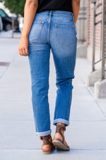KanCan Jeans  These mid-rise boyfriend jeans hit at exactly the right spot on your waist and with some spandex, these will stretch as you wear and get super comfy!  Color: Medium Blue Wash Cut: Cuffed Boyfriend, 27" Inseam* Rise: Mid-Rise, 9.25" Front Rise*  98% COTTON, 2% SPANDEX Stitching: Classic  Fly: Zipper Style #: KC8660M