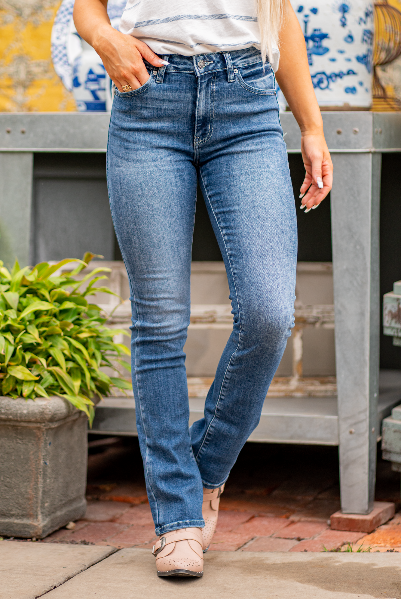 KanCan Jeans  KanCan Stretch Level: Stretchy  Color: Medium Blue Cut: Boot Cut, 32" Inseam* Rise: High-Rise, 10" Front Rise* 68% COTTON, 30% POLYESTER, 2%SPANDEX Stitching: Classic  Fly: Zipper Style #: KC8683M  Contact us for any additional measurements or sizing.  *Measured on the smallest size, measurements may vary by size.