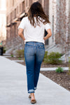 KanCan Jeans These 100% cotton mom jeans will become your go to! With no spandex, these jeans will mold to your body shape and feel amazing. Pair with heels or tennies, you cant go wrong with a high rise straight like these. Collection: Spring 2021 Color: Dark Blue Wash Cut: Straight Fit, 27" Inseam  Rise: High-Rise, 11" Front Rise 100% Cotton Fly: Zipper  Style #: KC7178D Contact us for any additional measurements or sizing.  