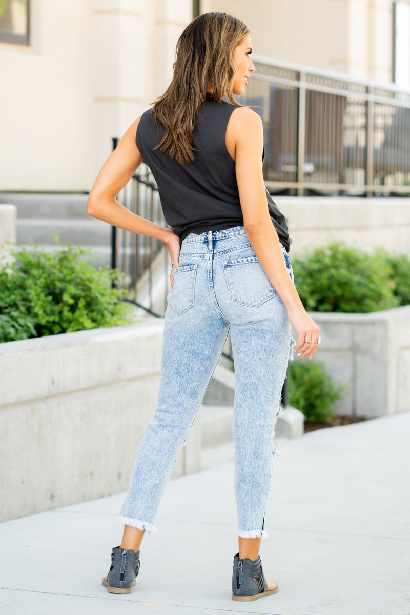 KanCan Jeans These mom jeans will become your go-to! Pair these girlfriend mom fit with sandals and a tee for an easy summer look.  Collection: Spring 2021 Color: Medium Blue Wash Cut: Straight Fit, 27" Inseam  Rise: High-Rise, 10.5" Front Rise 100% Cotton  Fly: Exposed Button Fly Style #: KC5201M Contact us for any additional measurements or sizing.  