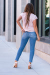 Vervet Flying Monkey Jeans  These mid-waisted straight-leg jeans have a soft stretch material that will feel so comfortable. With distressed legs, style with a front tuck and flats for a casual look.  Color: Medium Blue Wash  Cut: Straight, 27* Rise: Mid Rise, 9" Front Rise* Material: 92%COTTON, 6%POLYESTER, 2%SPANDEX Machine Wash Separately In Cold Water Stitching: Classic Fly: Zipper Style #: V2819 