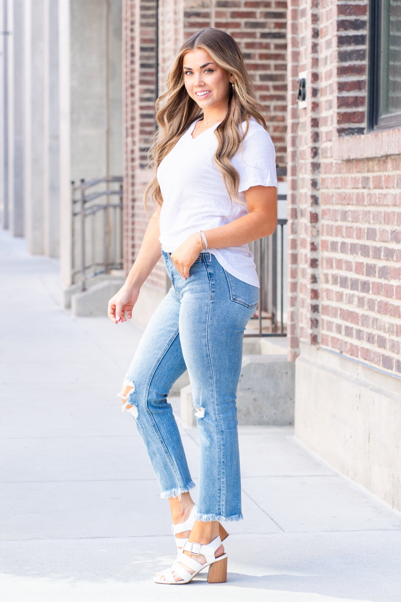 Vervet Flying Monkey Jeans  These high-waisted crop straight-leg jeans have a soft stretch material that will feel so comfortable. Cropped legs and slightly distressed detail with the classic 5-pocket design.   Color: Medium Blue Wash  Cut: Ankle Skinny, 26"* Rise: High-Rise, 10" Front Rise* Material: 90.5% COTTON 7.5% POLYESTER 2% SPANDEX Machine Wash Separately In Cold Water Stitching: Classic Fly: Zip Fly Style #: V2210