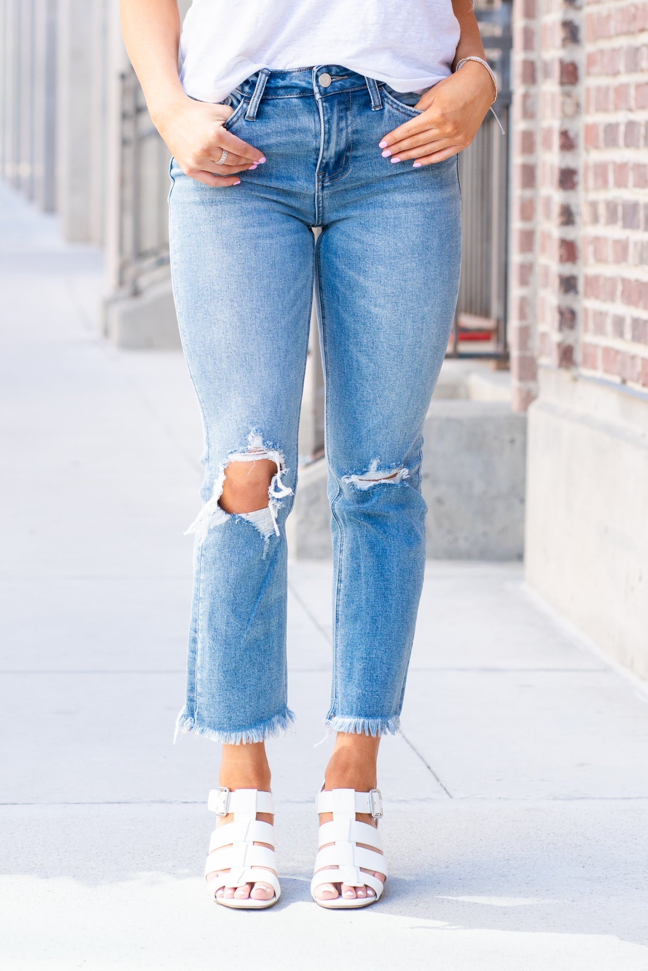 Vervet Flying Monkey Jeans  These high-waisted crop straight-leg jeans have a soft stretch material that will feel so comfortable. Cropped legs and slightly distressed detail with the classic 5-pocket design.   Color: Medium Blue Wash  Cut: Ankle Skinny, 26"* Rise: High-Rise, 10" Front Rise* Material: 90.5% COTTON 7.5% POLYESTER 2% SPANDEX Machine Wash Separately In Cold Water Stitching: Classic Fly: Zip Fly Style #: V2210