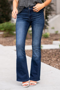 KanCan Jeans Collection: Core Style  Color: Dark Wash Cut: Flare, 31.5" Inseam  Rise: Mid-Rise, 9" Front Rise 54% COTTON 34% Rayon 10% POLYESTER 2% SPANDEX Fly: Zipper Style #: KC6102D-PT Contact us for any additional measurements or sizing.  Haley wears a size small top, a 1 in jeans and a small in tops. She is wearing a size 24/1 in these jeans.