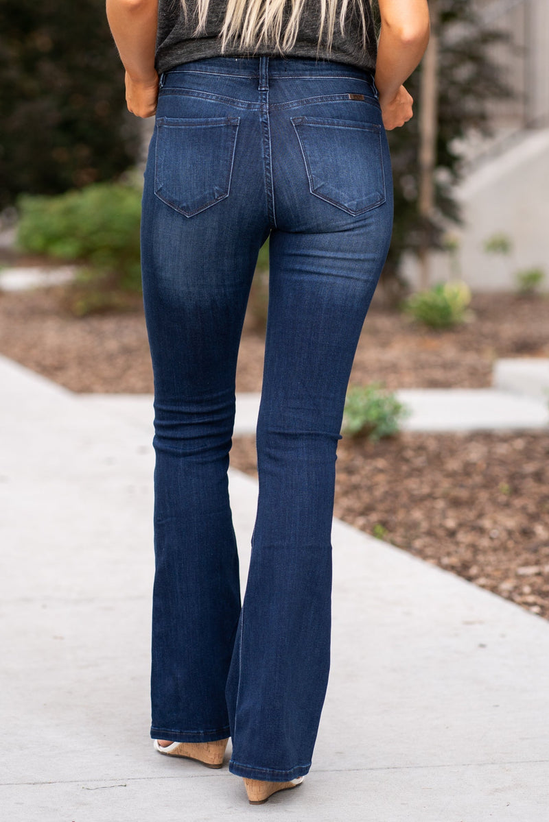 KanCan Jeans Collection: Core Style  Color: Dark Wash Cut: Flare, 31.5" Inseam  Rise: Mid-Rise, 9" Front Rise 54% COTTON 34% Rayon 10% POLYESTER 2% SPANDEX Fly: Zipper Style #: KC6102D-PT Contact us for any additional measurements or sizing.  Haley wears a size small top, a 1 in jeans and a small in tops. She is wearing a size 24/1 in these jeans.