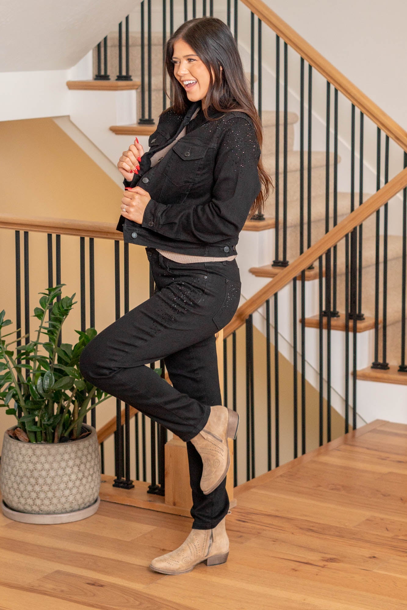 Judy Blue   Sprinkle some charm into your wardrobe with our adorable Rhinestone Delight Jacket in playful black stretchy fabric! This jacket isn't just about looking good; it's about sparkling with joy. The rhinestone detailing adds a touch of magic, making it perfect for adding a dash of cuteness to your outfits. Comfortable and stylish, it's your go-to for turning any day into a whimsical adventure!