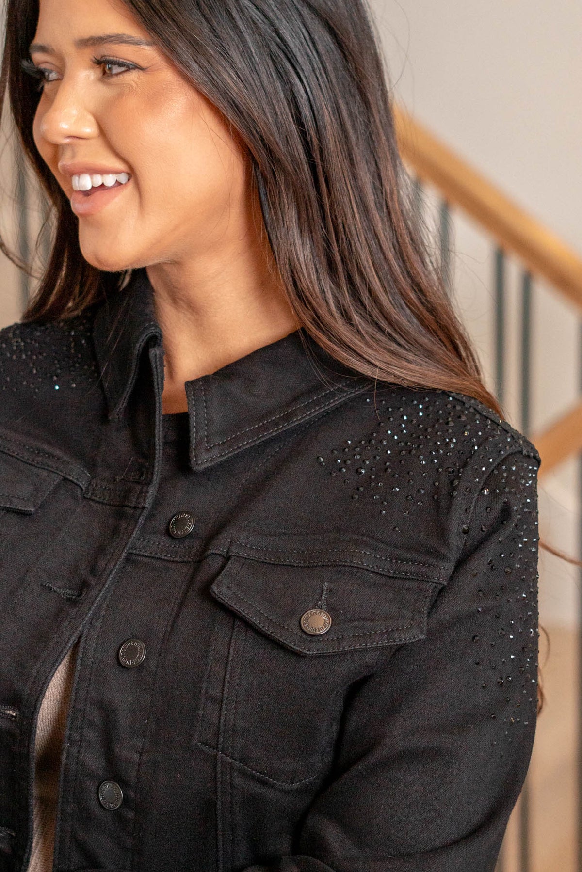 Judy Blue   Sprinkle some charm into your wardrobe with our adorable Rhinestone Delight Jacket in playful black stretchy fabric! This jacket isn't just about looking good; it's about sparkling with joy. The rhinestone detailing adds a touch of magic, making it perfect for adding a dash of cuteness to your outfits. Comfortable and stylish, it's your go-to for turning any day into a whimsical adventure!