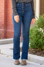 KanCan Jeans  KanCan Comfort Stretch Color: Dark Blue Cut: Boot Cut, 32" Inseam* Rise: High-Rise, 11" Front Rise* COTTON 94% POLYESTER 4% SPANDEX 2% Stitching: Classic  Fly: Zipper Style #: KC7138D Contact us for any additional measurements or sizing.  *Measured on the smallest size, measurements may vary by size.