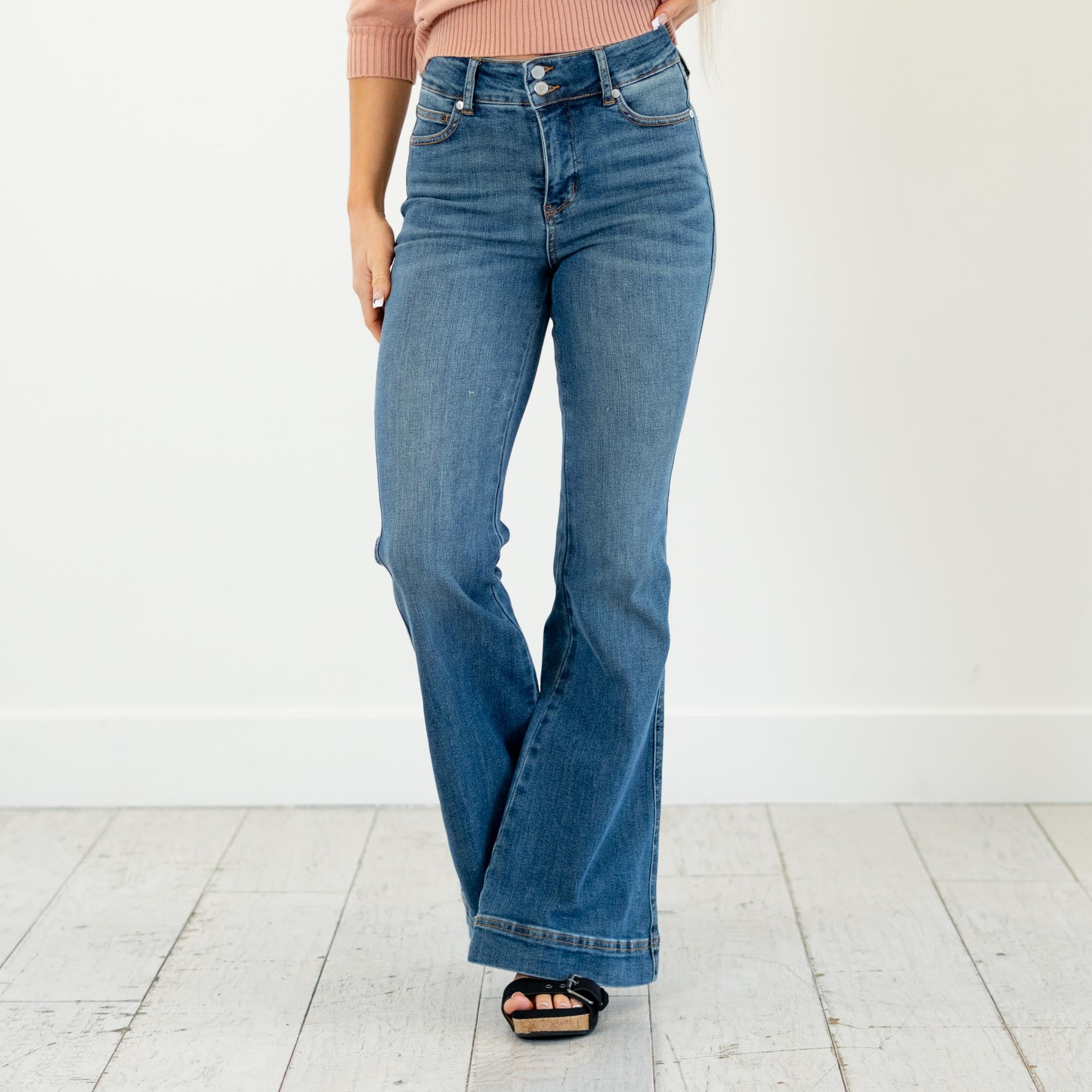 Judy Blue

High-rise tummy control, double-button waist, soft stretch flare—your new sculpting denim essential.

Color: Medium Blue

Cut: Flare, 10.75" Inseam*
Rise: High Rise, 33" Front Rise*
Material: 91% Cotton, 7% Polyester, 2% Spandex
Stitching: Classic
Fly: Zipper
Style #:&nbsp;Style # JB881018 | # 881018

*Measured on the smallest size, measurements may vary by size.

Contact us for any additional measurements or sizing.
