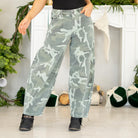Show out in our Xena High Rise Camo Horseshoe Jeans — a bold, sculptural silhouette that instantly elevates any outfit. Designed to sit comfortably at the high rise, this horseshoe shape curves wide through the thigh, then narrows back in toward the ankle for that oversized, baggy-but-polished look everyone’s obsessed with.

The allover camo print adds a street-style twist while still feeling wearable for everyday fits. Finished with a classic single-button closure, zip fly, and traditional 5-pocket styling