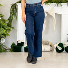 

VERVET by&nbsp;Flying Monkey Jeans


Effortless, modern, and made to flatter — the Genial High Rise Raw Hem Wide Leg Jeans feature soft comfort stretch denim with a polished yet easy silhouette. The high rise waist enhances your shape, while the clean-cut raw hem and ankle-length finish give these wide legs a fresh, on-trend look. Simple, sleek, and ready for everyday styling.&nbsp;

Color Name: Genial&nbsp;
Color: Dark Blue Wash
Cut: Wide Leg, 28" Inseam*
Rise: High-Rise, 10" Front Rise*
Leg Opening: 20"