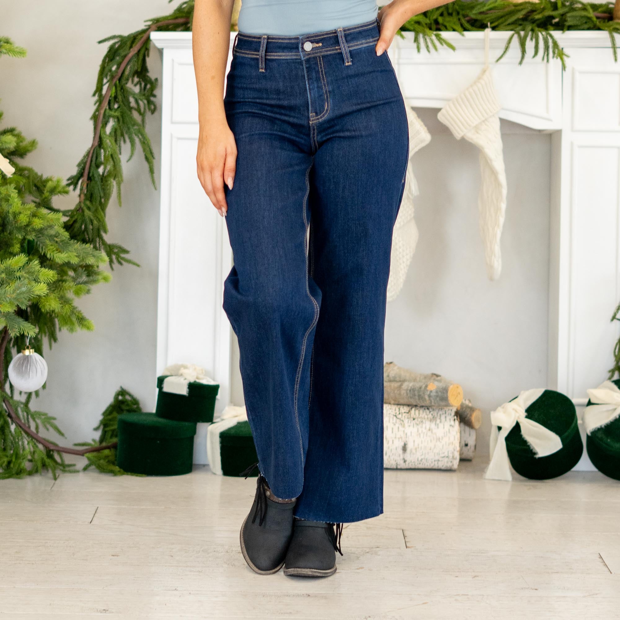 

VERVET by&nbsp;Flying Monkey Jeans


Effortless, modern, and made to flatter — the Genial High Rise Raw Hem Wide Leg Jeans feature soft comfort stretch denim with a polished yet easy silhouette. The high rise waist enhances your shape, while the clean-cut raw hem and ankle-length finish give these wide legs a fresh, on-trend look. Simple, sleek, and ready for everyday styling.&nbsp;

Color Name: Genial&nbsp;
Color: Dark Blue Wash
Cut: Wide Leg, 28" Inseam*
Rise: High-Rise, 10" Front Rise*
Leg Opening: 20"