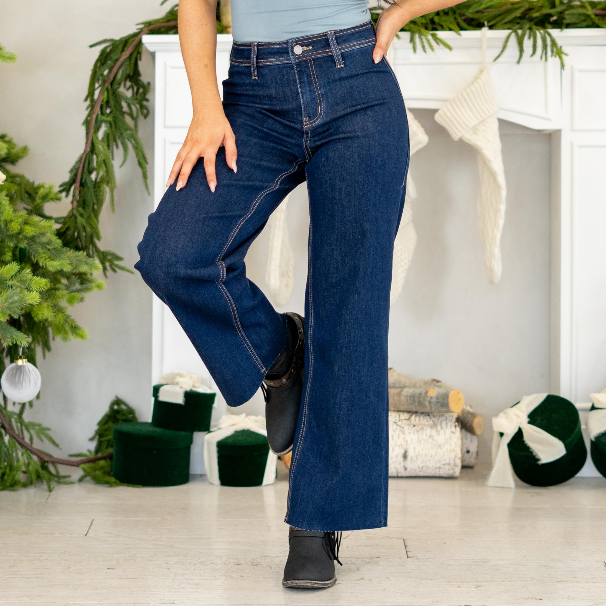 

VERVET by&nbsp;Flying Monkey Jeans


Effortless, modern, and made to flatter — the Genial High Rise Raw Hem Wide Leg Jeans feature soft comfort stretch denim with a polished yet easy silhouette. The high rise waist enhances your shape, while the clean-cut raw hem and ankle-length finish give these wide legs a fresh, on-trend look. Simple, sleek, and ready for everyday styling.&nbsp;

Color Name: Genial&nbsp;
Color: Dark Blue Wash
Cut: Wide Leg, 28" Inseam*
Rise: High-Rise, 10" Front Rise*
Leg Opening: 20"