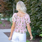 Hem &amp; Thread

Sweet, feminine, and effortlessly charming. This floral gingham blouse features puff sleeves, a flattering square neckline, and a smocked bodice that hugs in all the right places. Finished with a soft ruffled hem, it’s the perfect top for pairing with your favorite denim.

Round Neckline&nbsp;
90% RAYON 10% NYLON&nbsp;
37890-Pink

Contact us for any additional measurements or sizing.&nbsp;