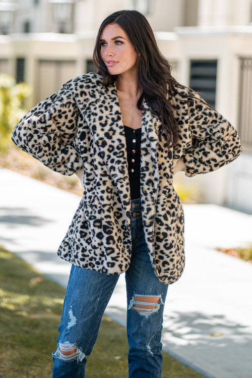Hem & Thread   Feel your inner animal in this leopard print sherpa jacket. Pair with a great boyfriend denim in heels for a trendy fun look.  Collection: Fall 2020 Color: Leopard Neckline: Open Sleeve: Long 100% POLYESTER 97% ACRYLIC 3% SPANDEX Style #: 8432 Contact us for any additional measurements or sizing.  Haley is 5’6" and wears size 3 in jeans, a small top and 7.5 in shoes. This jacket is a one size fits most and looks great on everyone!