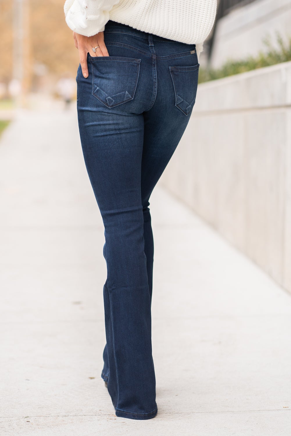 KanCan Jeans Collection: Core Style  Color: Dark Wash Cut: Flare, 33.75" Inseam  Rise: Mid-Rise, 9" Front Rise 54% 54% COTTON 34% Rayon 10% POLYESTER 2% SPANDEX Fly: Zipper Style #: KC6102D Contact us for any additional measurements or sizing.  Taylor is 5'7" and wears a size 4 in jeans, small top and an 8.5 in shoes. She is wearing a size size 25/3 in these jeans.