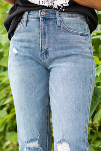 KanCan Jeans  These high-rise slim straight jeans hit at exactly the right spot on your waist. With 100% cotton, these rigid jeans will mold your body as you wear them.   KanCan Stretch Level: Rigid  Cut: Cuffed Boyfriend, 27" Inseam Rise: High-Rise, 10.5" Front Rise 100% Cotton Stitching: Classic  Fly: Zipper Style #: KC7865M Contact us for any additional measurements or sizing. 