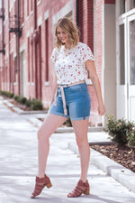 Miss Me Collection: Spring 2020 Color: Light Wash Cut: Cuffed Hem Mid Thigh with Boho Chic Pink Belt Rise: High-Rise, 10" Front Rise Material: 64% Cotton 21% Polyester 12% Viscose 3% Elastane Machine Wash Separately In Cold Water Stitching: Classic Fly: Zipper Fly Style #: H2267D  Contact us for any additional measurements or sizing.