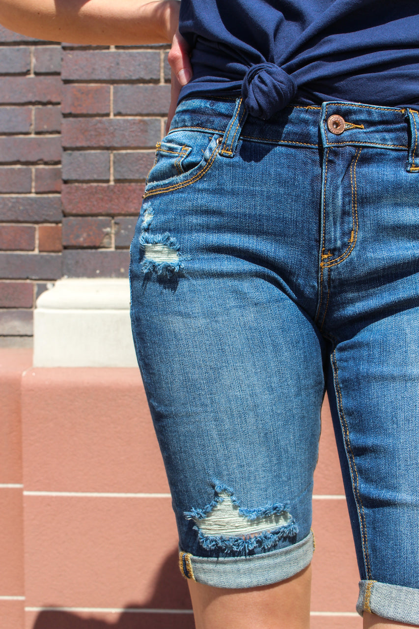 Distressed Bermuda Shorts from A2 Jeans by Special A  Collection: Spring 2020 Bermuda Shorts Mid Rise waist, 8.5" Front Rise Shorts, 12.5" Inseam Medium Wash Material: 98% COTTON 2% Elastane Stitching: Classic Fly: Zipper Style #: IS5638D  Contact us for any additional measurements or sizing.  Small/1-3 Medium/ 5-9 Large/9-13