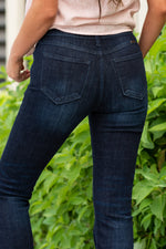 KanCan Jeans  KanCan Stretch Level: Comfort Stretchy  Color: Dark Blue Cut: Boot Cut, 31" Inseam* Rise: High-Rise, 9.5" Front Rise* 94.3% COTTON , 4.9% T400 , 0.8% SPANDEX Stitching: Classic  Fly: Exposed Button Fly Style #: KC7348D Contact us for any additional measurements or sizing.  *Measured on the smallest size, measurements may vary by size.