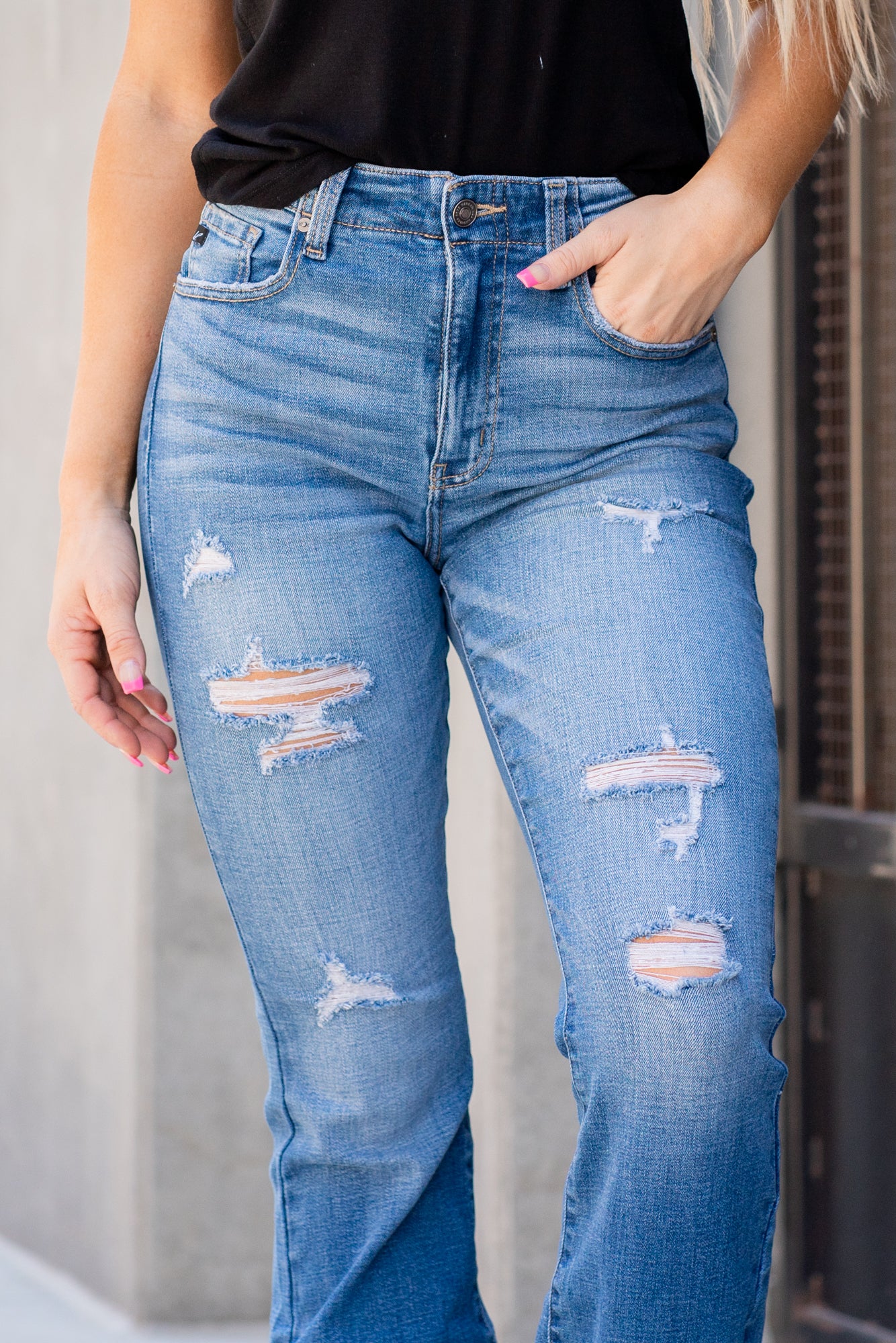 KanCan Jeans  You will love the way these flare cuts fit your curves. Dress up with heels and a cute flutter sleeve top for a night out.  Color: Medium Blue Cut: Flare Cut, 34" Inseam* Rise: High-Rise, 11" Front Rise* 98% COTTON, 2% SPANDEX Stitching: Classic Fly: Zipper Style #: KC9322M Contact us for any additional measurements or sizing. 