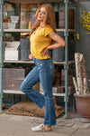 Flying Monkey Jeans Wash: Dark Blue Cut: Boot Cut, 29" Inseam* Rise: High Rise, 10" Front Rise* 93% COTTON 5% POLYESTER 2% SPANDEX Stitching: Classic Fly: Zipper  Style #: F4096 Contact us for any additional measurements or sizing.  *Measured on the smallest size, measurements may vary by size.  Sarah wears a size 25 in jeans, a small in tops, and 8 in shoes. She is wearing size 25 in these jeans.