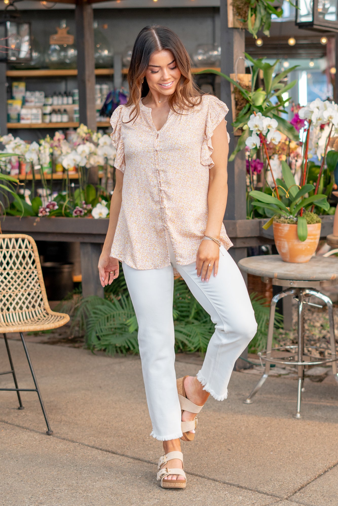Ruffle Sleeve Top  Color: Neutral Coral Neckline: Button Down Sleeve: Flutter Sleeve Material: 100% Rayon Style #: 43000T-Neutral Orange Contact us for any additional measurements or sizing.  *Measured on the smallest size, measurements may vary by size.