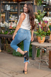 KanCan Jeans  With a high waist and straight fit, these will be your go-to jeans that will never go out of style. Color: Medium Blue  Cut: Cropped Straight Fit, 25" Inseam* Rise: High-Rise, 10.5" Front Rise* 93% COTTON, 5% POLYESTER, 2% SPANDEX Fly: Exposed Button Fly Style #: KC2560M