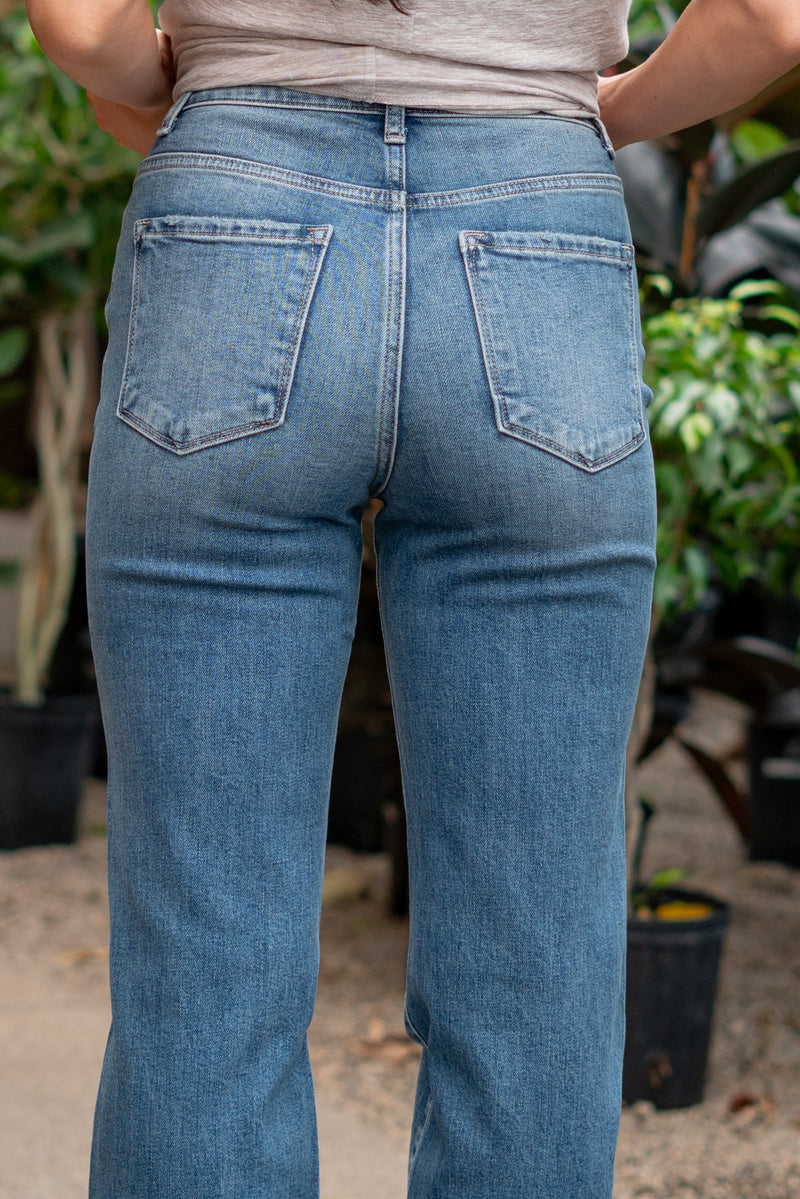 Flying Monkey Jeans Wash: Medium Blue Name: Young Folks Cut: Flare, 34" Inseam* Rise: High Rise, 11.5" Front Rise* 99%COTTON 1%SPANDEX Stitching: Classic Fly: Zipper  Style #: F4425 Contact us for any additional measurements or sizing.    *Measured on the smallest size, measurements may vary by size.  Jacquelyn wears a size 25 in jeans, a small in tops, and 6.5 in shoes. She is wearing a size 25 in these jeans.