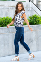 Judy Blue  A dark wash mid-rise skinny with a folded hem that can be unfolded to add length for longer inseams. Color: Medium Blue  Cut: Skinny fit, 28.5" Cuffed* | 32" Inseam Uncuffed* Mid Rise, 9.75" Front Rise* Material: 52% Cotton, 23% Polyester, 22% Rayon, 3% Spandex Stitching: Classic Fly: Zipper Fly Style #: JB82340 | 82340 Contact us for any additional measurements or sizing.    *Measured on the smallest size, measurements may vary by size.   