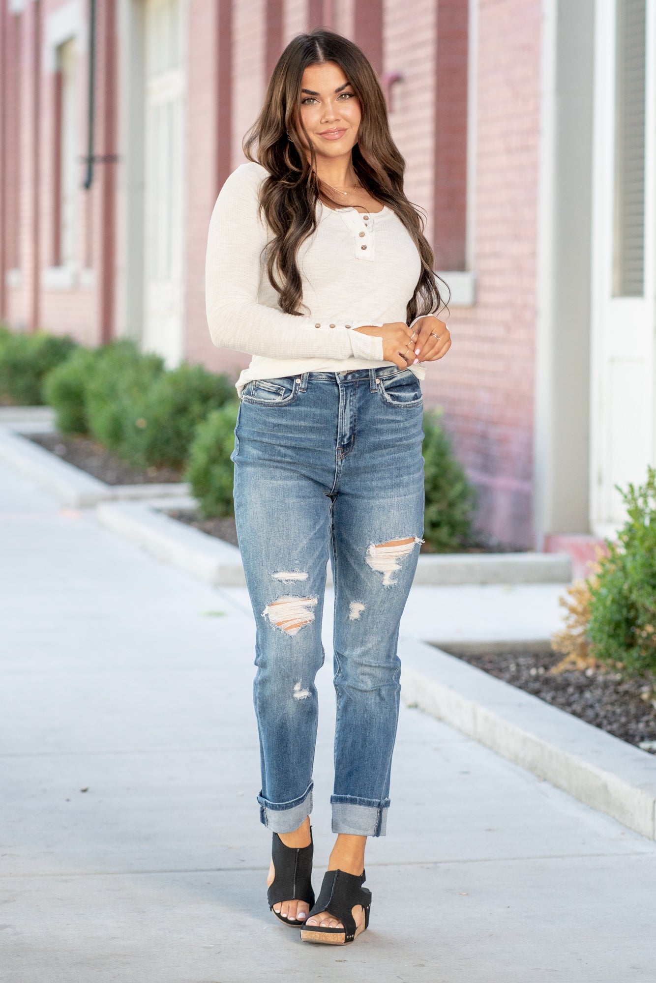 Denim by Zenana   Color: Medium Blue Wash   Cut: Mom Fit, 26.5" Inseam*  Rise: High-Rise, 11.25" Front Rise* Leg Opening: 13.25"* Material: 93% COTTON 5% POLYESTER 2% SPANDEX Fly: Zip Fly  Style #: DPP-1670MM Contact us for any additional measurements or sizing.  *Measured on the smallest size, measurements may vary by size.  Jacquelyn wears a size 25 in jeans, a small in tops, and 6.5 in shoes. She is wearing size 25 in these jeans