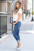 KanCan Jeans  These boyfriend jeans will become your go-to! Pair these boyfriend/mom fit with booties and a tee for an easy fall look.  Color: Medium Blue Wash Cut: Straight Fit, 25" Inseam Cuffed*  Rise: High-Rise, 9.5" Front Rise* Material: 100% Cotton Fly: Zipper Style #: KC8559M Contact us for any additional measurements or sizing.