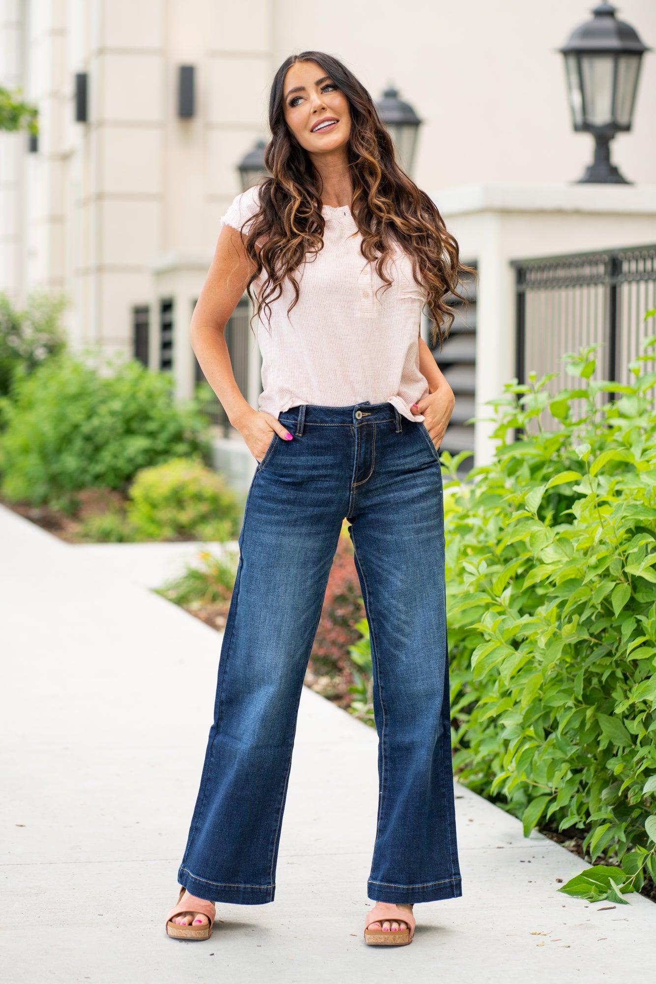 KanCan Jeans   KanCan Stretch Level: Comfort Stretch  Wide Leg Trouser Color: Dark Blue Wash Cut: Flare, 32" Inseam  Rise: High Rise, 11" Front Rise 99% COTTON, 1% SPANDEX Fly: Exposed Button Fly Style #: KC7126D  Contact us for any additional measurements or sizing.  *Measured on the smallest size, measurements may vary by size. 