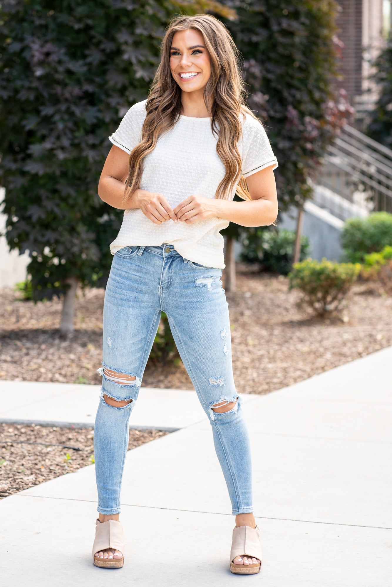 VERVET by Flying Monkey Jeans  This comfortable stretchy denim has a distressed detail, calf-hugging fit, fray hem bottom, and a 5 button-exposed fly with a distressed back pocket. Skinny Cut, 27" Inseam* Mid Rise, 9" Front Rise* 92%COTTON, 6%POLYESTER, 2%SPANDEX Machine Wash Separately In Cold Water Stitching: Classic Fly: Zipper Fly Style #: V2948 Contact us for any additional measurements or sizing.    *Measured on the smallest size, measurements may vary by size. 