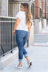 KanCan Jeans  These boyfriend jeans will become your go-to! Pair these boyfriend/mom fit with booties and a tee for an easy fall look.  Color: Medium Blue Wash Cut: Straight Fit, 25" Inseam Cuffed*  Rise: High-Rise, 9.5" Front Rise* Material: 100% Cotton Fly: Zipper Style #: KC8559M Contact us for any additional measurements or sizing.