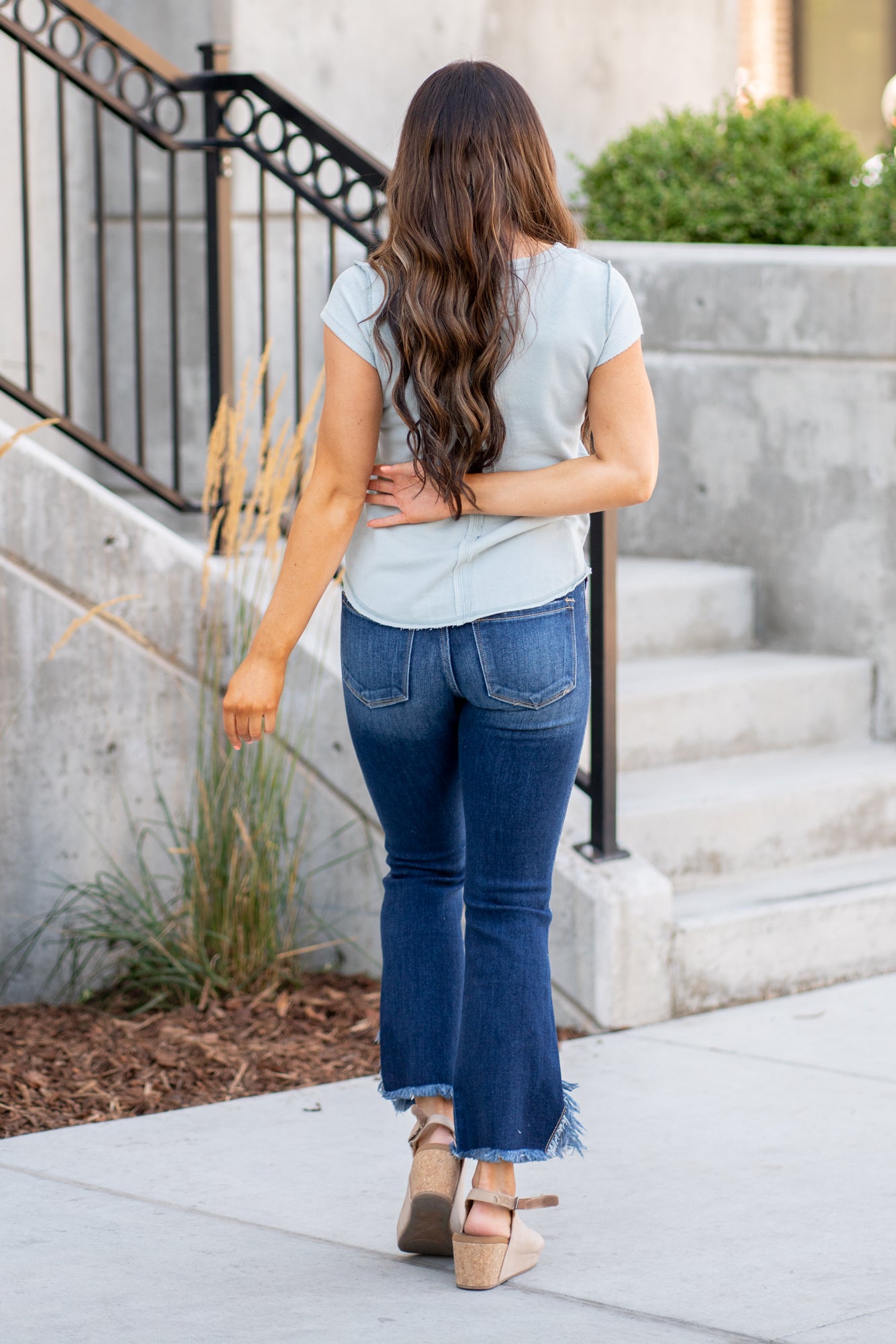 La Miel   Color: Cloud Blue V Neck Fitted Short-Sleeved Style #: JBT7655-CloudBlue *Measured on the smallest size, measurements may vary by size.  Contact us for any additional measurements or sizing.   Alyssa is 5'5" and wears a size 25 in jeans, a small in tops, and 8 in shoes. She is wearing a size small in this top. 